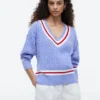 Cricket-sweater i kabelstrik Cricket-sweater i kabelstrik