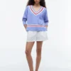 Cricket-sweater i kabelstrik Cricket-sweater i kabelstrik